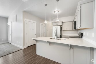 Building Photo - Modern 3-Bedroom Condo in Prime Riverton L...