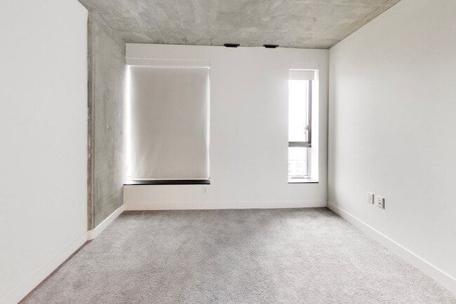 Building Photo - Urban Luxury at SoMa Serif Condos 2BR/2BA | In-Unit Laundry & 24-Hour Security
