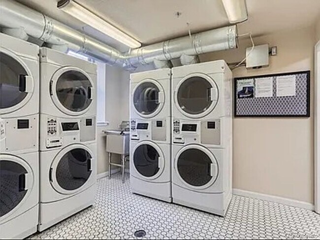 Building Photo - PRICED REDUCED!! Large windows and exposed...