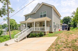 Building Photo - Two Story Duplex With Hardwood Flooring and White Cabinetry