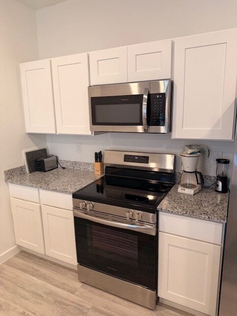Building Photo - $1400.00 MOVE IN CREDITv- Charming 2-Bed with Granite Elegance on Tennessee Ave, Centerton!