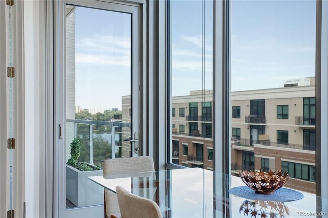 Building Photo - Stunning 2-Bedroom Condo at Sloan's Lake's Premier Lakehouse Community