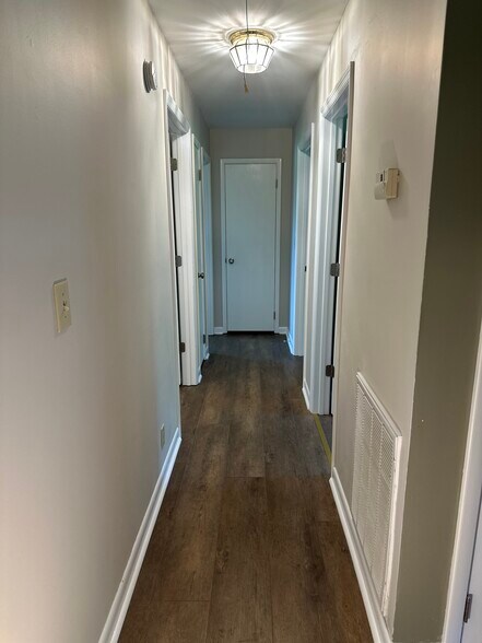 Hallway from the LR to all bedroom and bathroom. - 9 Garden Ln