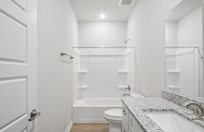 Building Photo - "Charming 3-Bedroom Duplex in San Antonio with Granite Elegance!"