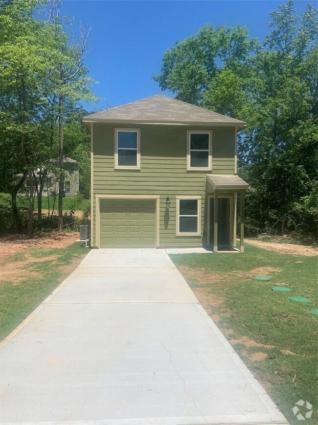 Building Photo - This home is a brand new beauty tucked bac...