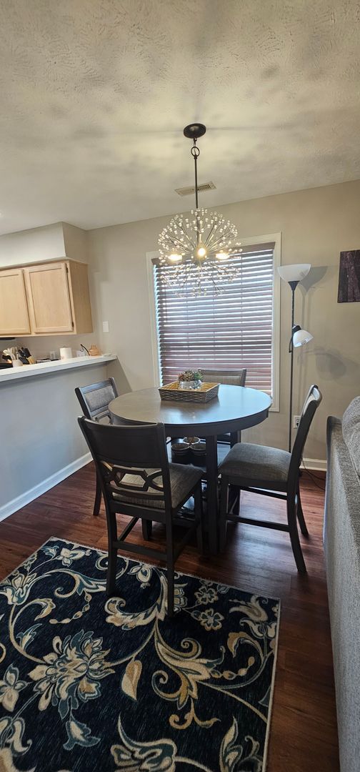 Building Photo - -First-Floor End-Unit | Fully Furnished 2B...