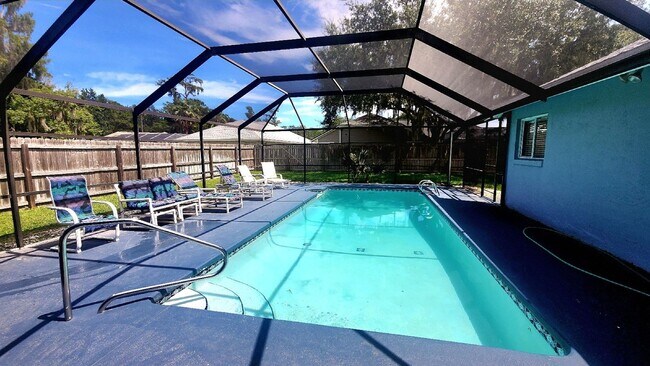 Building Photo - The Woodlands of Palm Coast- FURNISHED- 4 Bedroom 2 Bath- Long Term