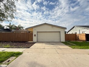 Building Photo - College View Estates Gem – Spacious 3BR Home with Private Yard & RV Parking