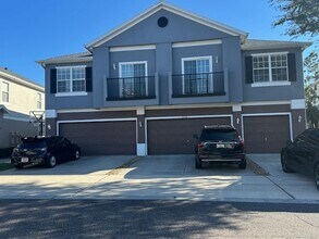 Building Photo - Spacious 2 Bed / 2 Bath Townhome with Garage – Gated Community in Orlando – $1,920/mo (Resident B...