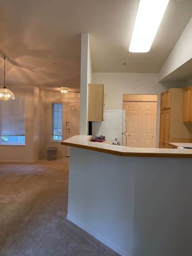 Building Photo - Bright, Spacious, Updated Condo with Separ...