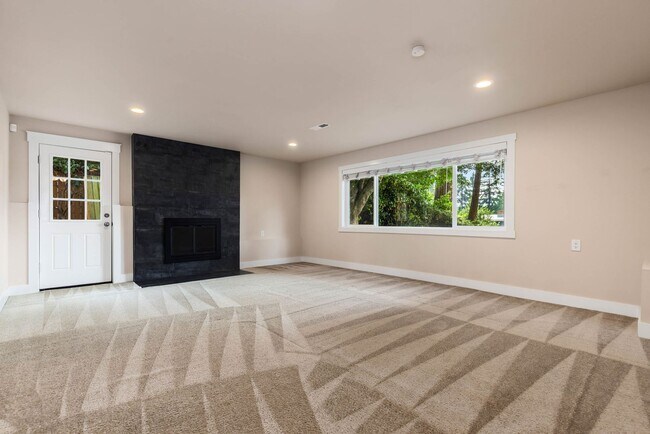 Building Photo - Updated Split-Level Home with Flexible Living Spaces & Backyard Deck