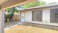 Building Photo - 2/1 duplex with covered parking