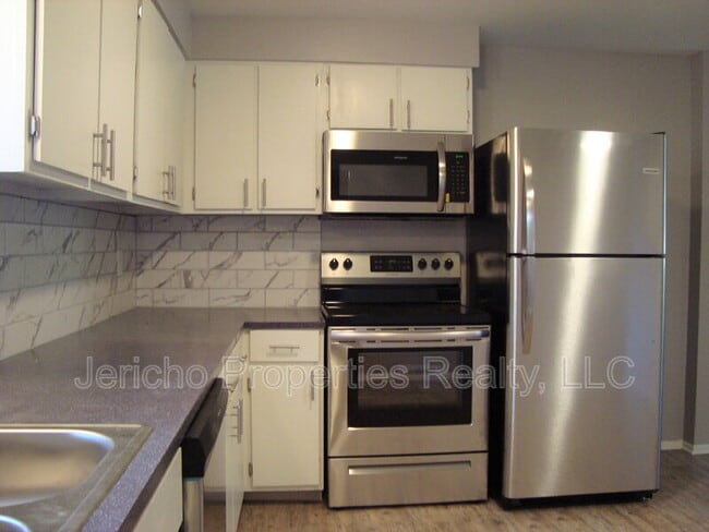 Building Photo - 12909 W 26th Ave