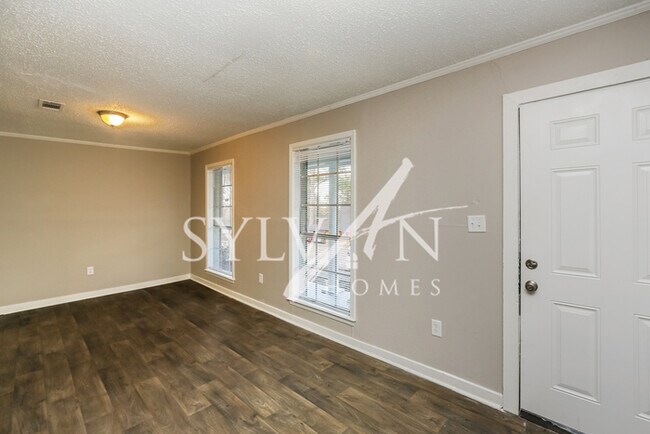 Building Photo - This 4 bedroom, 2 bathroom home is exactly...