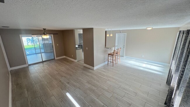 Building Photo - IMMACULATE 4 Bedroom, 2 Bathroom Home in Cocoa Beach!! ONLY MINUTES from the Beach!! (Lawn Care I...