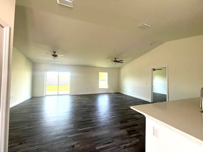 Building Photo - Available Now!! NW CAPE CORAL - 4 Bedrooms - 3 Bathrooms - 2 Car Garage
