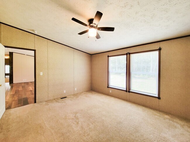 Building Photo - Cozy and Adorable home 4 bedroom 2 bath home on over 1 acre near McRae Lake! Relax on the covered...