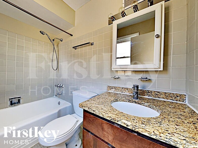 Building Photo - 1573 W 100th Pl