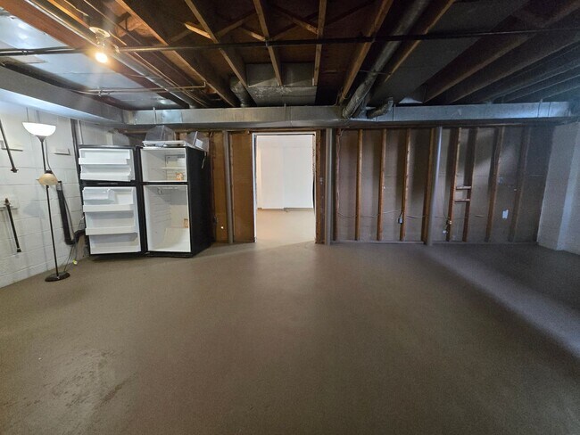 Building Photo - Updates abound at this SPACIOUS, half duplex with 3+ off-street parking spots, 3-bedrooms and 2 f...