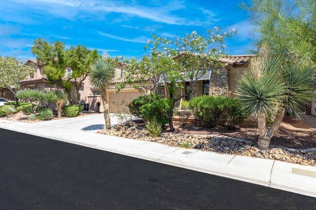 Building Photo - Spacious Mountain’s Edge Home with Den, Sunroom, 3-Car Garage & Private Spa Retreat