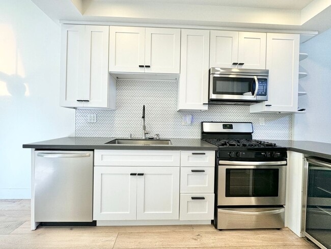 Building Photo - Stunning 3BD Home in Costa Mesa — 2 Car Attached Garage, Pool, Tennis Court & Modern Upgrades