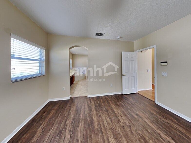 Building Photo - 7009 Cascades Ct