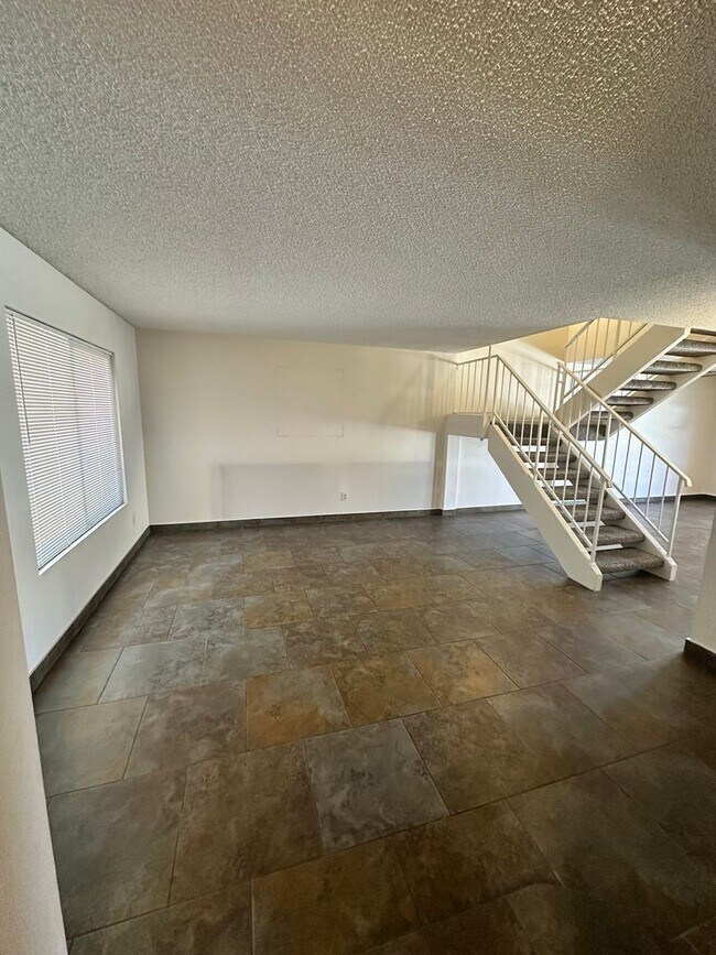 Building Photo - Stunning & Spacious 2 BR / 2.5 BA Townhome – Move-In Ready!