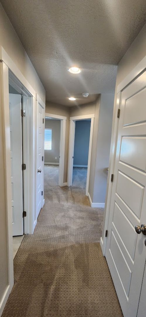 Building Photo - $2,000 OFF 4-bed, 3.5-bath Townhome Available Now!