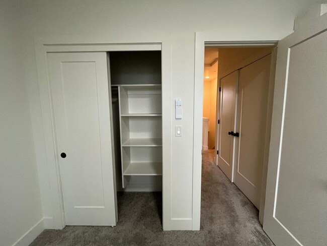 Building Photo - Modern 2-Bed, 1.5-Bath Condo with Custom Kitchen, Private Patio, and Prime Location