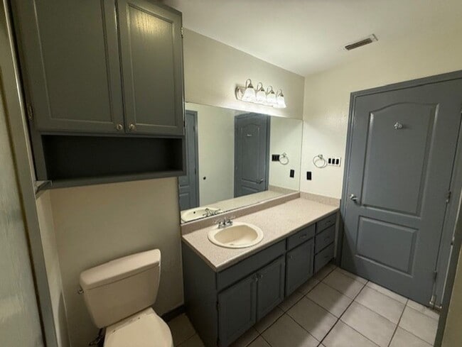 Building Photo - Downstairs -Three-bedroom Condo