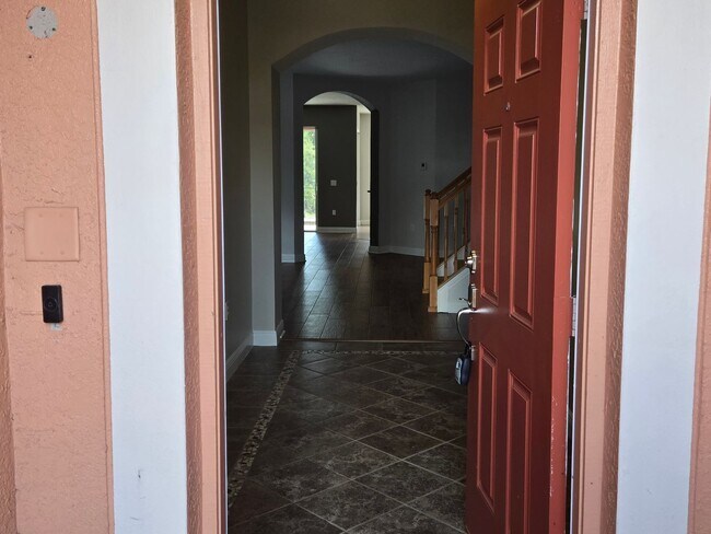 Building Photo - Freshly Painted 4BR/2BA Pool Home with Screened Pool & Spa – Move-In Ready!