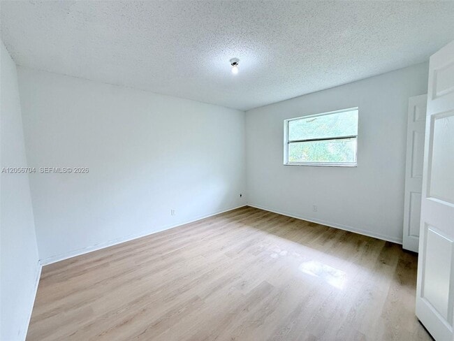 Building Photo - 3100 Coral Springs Dr