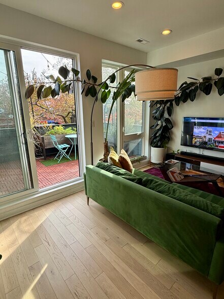 Step out from the living room onto the front roof deck - 3916 14th St NW