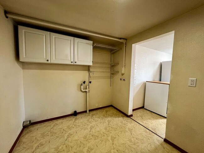 Building Photo - Non-Refundable & Security Deposit Total: $1700.00
