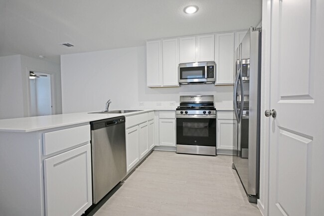 Building Photo - 15023 Azzurro Stone