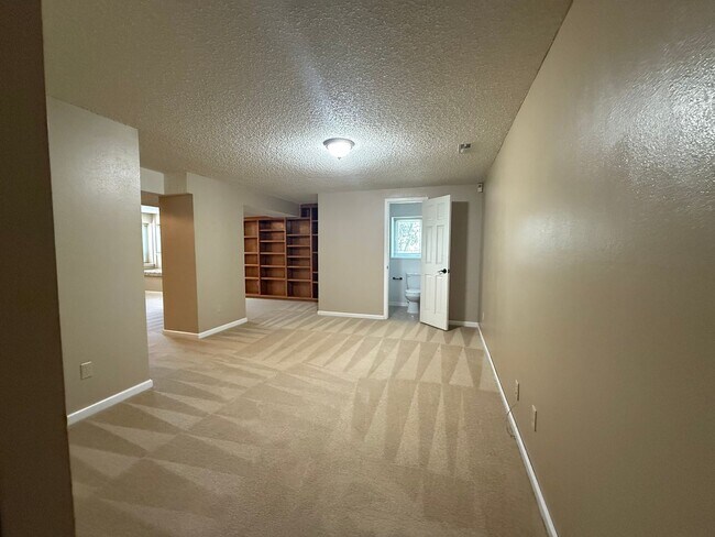 Building Photo - 5BD/4BA/3 car garage w Flat Yard Cheyenne ...