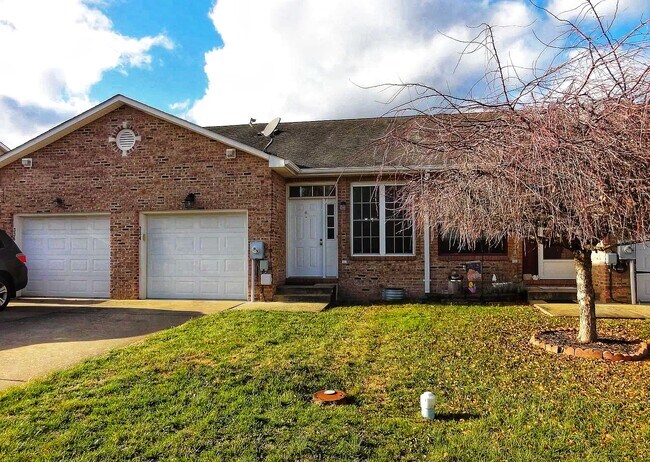 Front door and garage - 334 Lora Dr