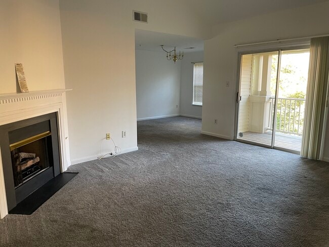 Large living/family room with fireplace - 9101 Gracious End Ct