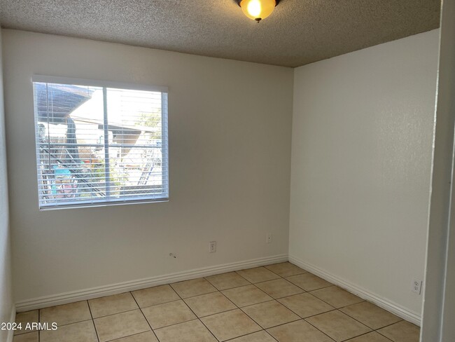 Building Photo - 8333 W Roma Ave