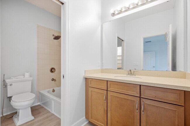 Building Photo - Spacious 6-Bedroom Home Near Lake Nona | 3-Car Garage + Tesla Charger