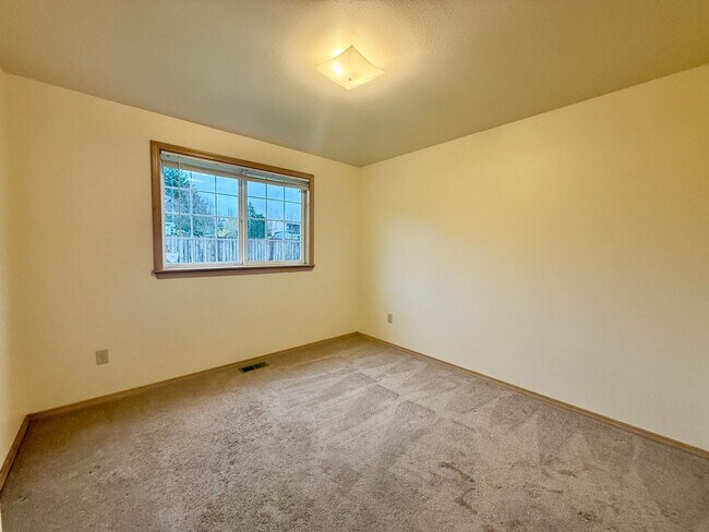 Building Photo - Sunny Rambler on Corner Lot with Large Fenced Yard & Deck