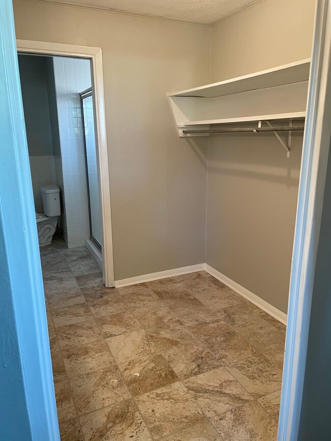 Front bedroom closet with access to second bath - 1925 Driskill St