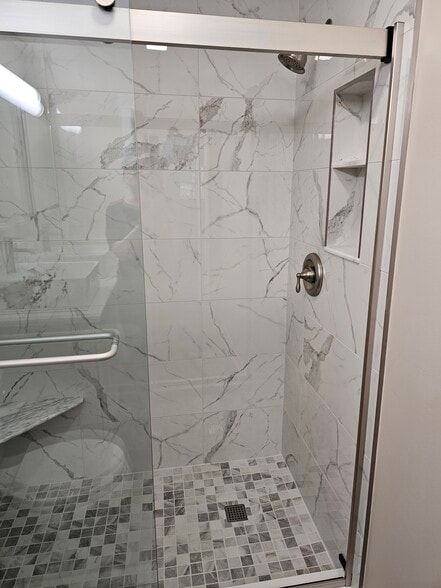 brand newceramic-tile shower with glass doors,seat and nook for shower items. - 2788 Blossom Ave