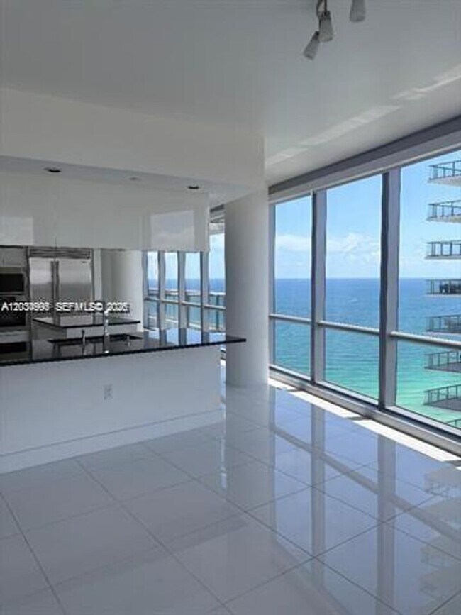 Building Photo - 17121 Collins Ave