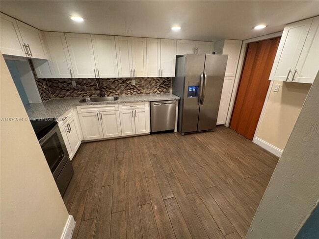 Building Photo - 6521 Racquet Club Dr