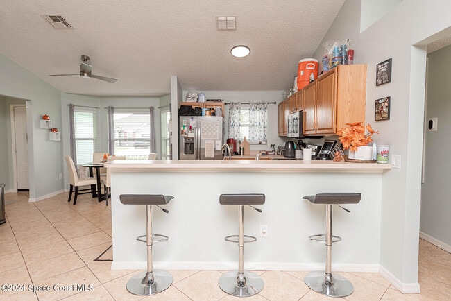 Building Photo - 721 Taluga Ave SE