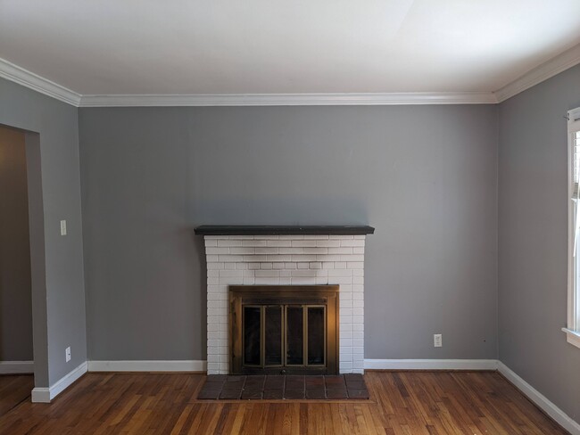 Living room with gas log fireplace - 2221 California St SE