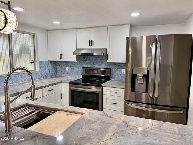 Building Photo - 5817 W Tierra Buena Ln