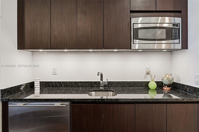 Building Photo - 9705 Collins Ave