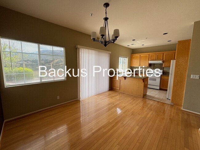 Building Photo - Great two-level home in Las Palmas II with scenic views